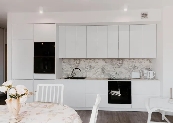 U Siebie W Domu. W Nowej Dzielnicy. Daire *